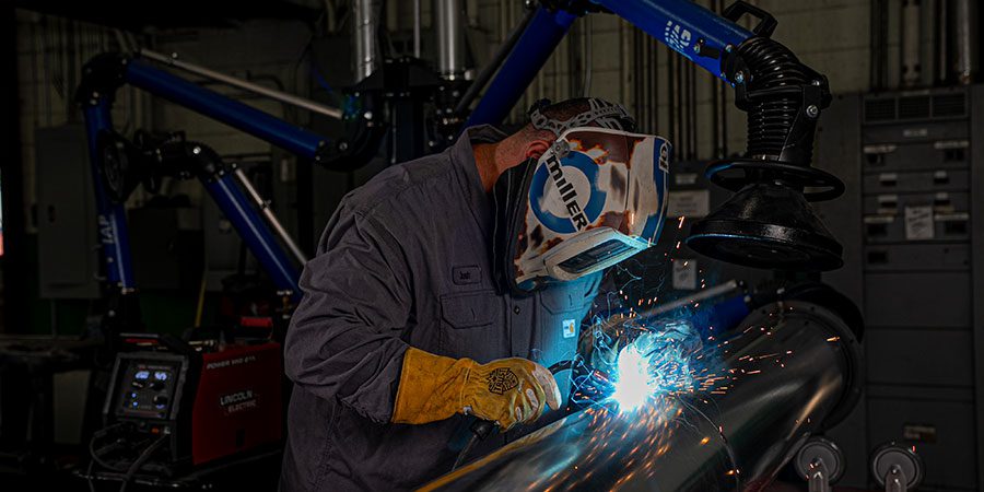 Man Welding HVAC component
